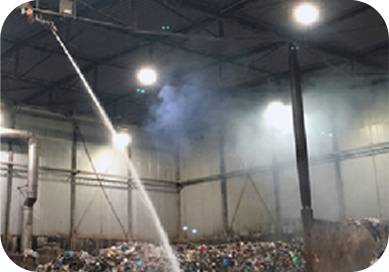 Remote-operated fire safety solution protecting waste storage in waste-to-energy systems